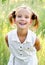 Portrait of adorable smiling little girl child in dress outdoor