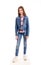 Portrait of adorable smiling little girl child preteen standing in jeans isolated