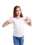 Portrait of adorable smiling little girl child preteen in the white t-shirt pointing to yourself by forefingers isolated