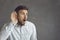 Portrait of adult man eavesdrop with hearing gesture listen shock news