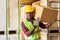 Portrait of Afican Black warehouse worker hold box