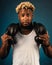 Portrait of an African American with boxing shoulders around his neck. Newbie to the boxing section.