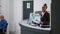 Portrait of african american receptionist working at registration desk