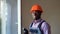 Portrait of African American windows installation worker with screwdriver