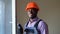 Portrait of African American windows installation worker with screwdriver