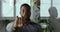 Portrait of African male American manager office worker international student sitting in room showing no sign with