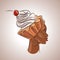 Portrait of an African woman in profile with a cream cake and a cherry on her head. Creative pastry art drawing