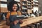 Portrait of an african young female cafe owner