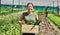 Portrait, agriculture and a woman in a greenhouse on a farm for sustainability in the harvest season. Smile, spring and