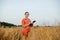 Portrait Agronomist farmer with digital tablet computer in wheat field