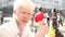 Portrait of an albino man standing outdoor