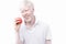 Portrait of an albino man in studio dressed t-shirt isolated on a white background. abnormal deviations. unusual appearance