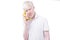 Portrait of an albino man in studio dressed t-shirt isolated on a white background. abnormal deviations. unusual appearance