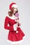 Portrait of Alluring Caucasian Red haired Santa Helper