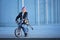 A portrait of american boy sitting on bike outdoor.