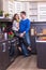 Portrait Of Amorous Couple With apple In The Kitchen