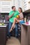 Portrait Of Amorous Couple With food In The Kitchen