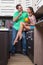 Portrait Of Amorous Couple With food In The Kitchen