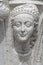 Portrait of ancient aged sculpture of beautiful Venetian Renaissance Era woman in Venice, Italy, closeup, details