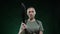 The portrait of an angry bald military woman, with a gesturing hand in which she holds a machete, cut off your head