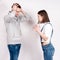 Portrait of an angry couple shouting each other against white background