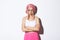 Portrait of angry cute girl with pink wig and glamour makeup, cross arms on chest and sulking mad at someone, feeling