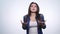 Portrait of angry long-haired woman negatively shaking head saying no waving hands in denial over white background