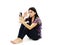 Portrait of an angry woman with clenched fist looking at her cellphone