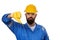 Portrait architect builder in transparent safety glasses. Bearded man worker in hard hat with angry face showing dislike