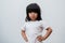 Portrait of Asian angry and sad little girl on white isolated background, The emotion of a child when tantrum and mad, expression