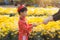 Portrait of a Asian boy on traditional festival costume. Cute little Vietnamese boy in ao dai dress smiling. Tet holiday. Lunar Ne