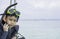 Portrait Asian Boy wearing a life jacket and scuba diving Background sea
