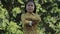 Portrait of asian children acting in green park