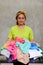 Portrait of Asian Ethnic adult Woman with basket of Laundry