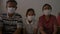 Portrait of a asian family wearing protective mask in quarantine to prevent from coronavirus.