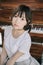 Portrait of asian girl with white shirt with piano vintage film style