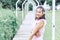 Portrait of asian happy woman smilling with flower garden , Selective focus