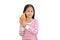 Portrait Asian little child girl holding croissant isolated on white background