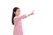 Portrait Asian little girl point index finger pressing an imaginary button isolated on white background with copy space