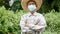 Portrait of Asian senior wearing facial mask for protection from air pollution or virus epidemic when stay outdoors. Health care c