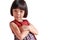 Portrait of an Asian Thai girl, aged 4 to 6 years old, cute face, short hair, wearing a skirt. standing with arms crossed She is a