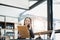 Portrait of a Asian woman lawyer studying lawsuit a for a client using smartphone , documents and computer to work