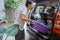 Portrait of asian woman with own luggage ready to go