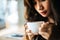 Portrait asian woman smiling relax in coffee shop