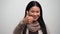 Portrait of Asian woman with thumb up