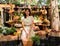 Portrait of an Asian woman with a wicker shopping basket on a farmers market