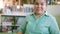 Portrait of Asian young blind person woman reading Braille book studying in creative library