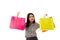 Portrait of Asian young lady roll her eyes, holding colorful shopping bags. The  business  woman with shopping therapy in casual