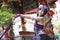 Portrait of asian young woman dancing with purple Chinese dress cosplay with temple