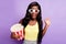 Portrait of astonished dark skin lady wear 3d glasses open mouth raise hand palm isolated on purple color background